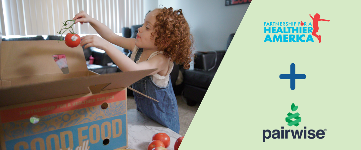 Image of a young girl taking fresh produce out of a PHA Good Food for All box. The PHA and Pairwise logos are ontop of a light green overlay on the right side of the image.